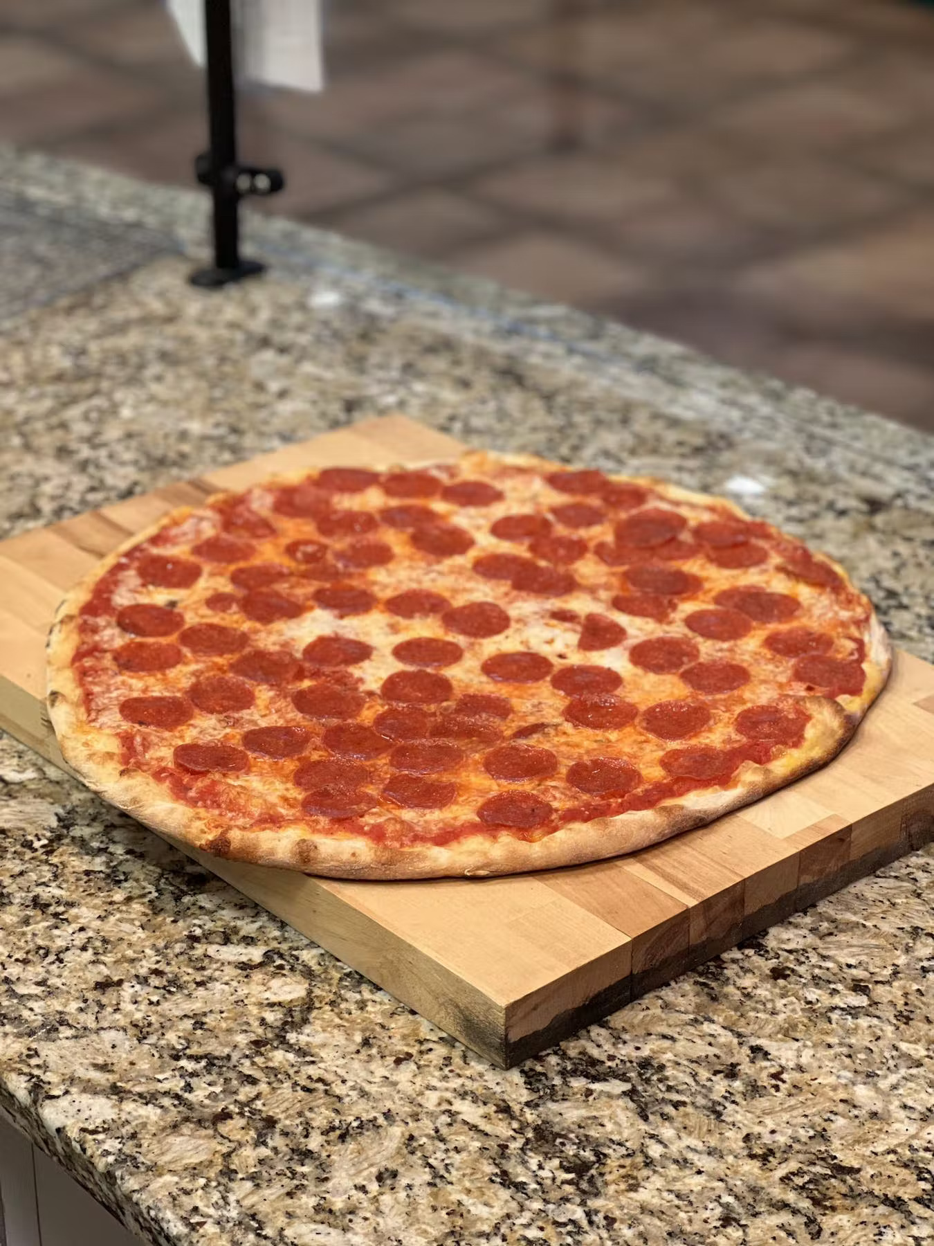 a pizza sitting on top of a table