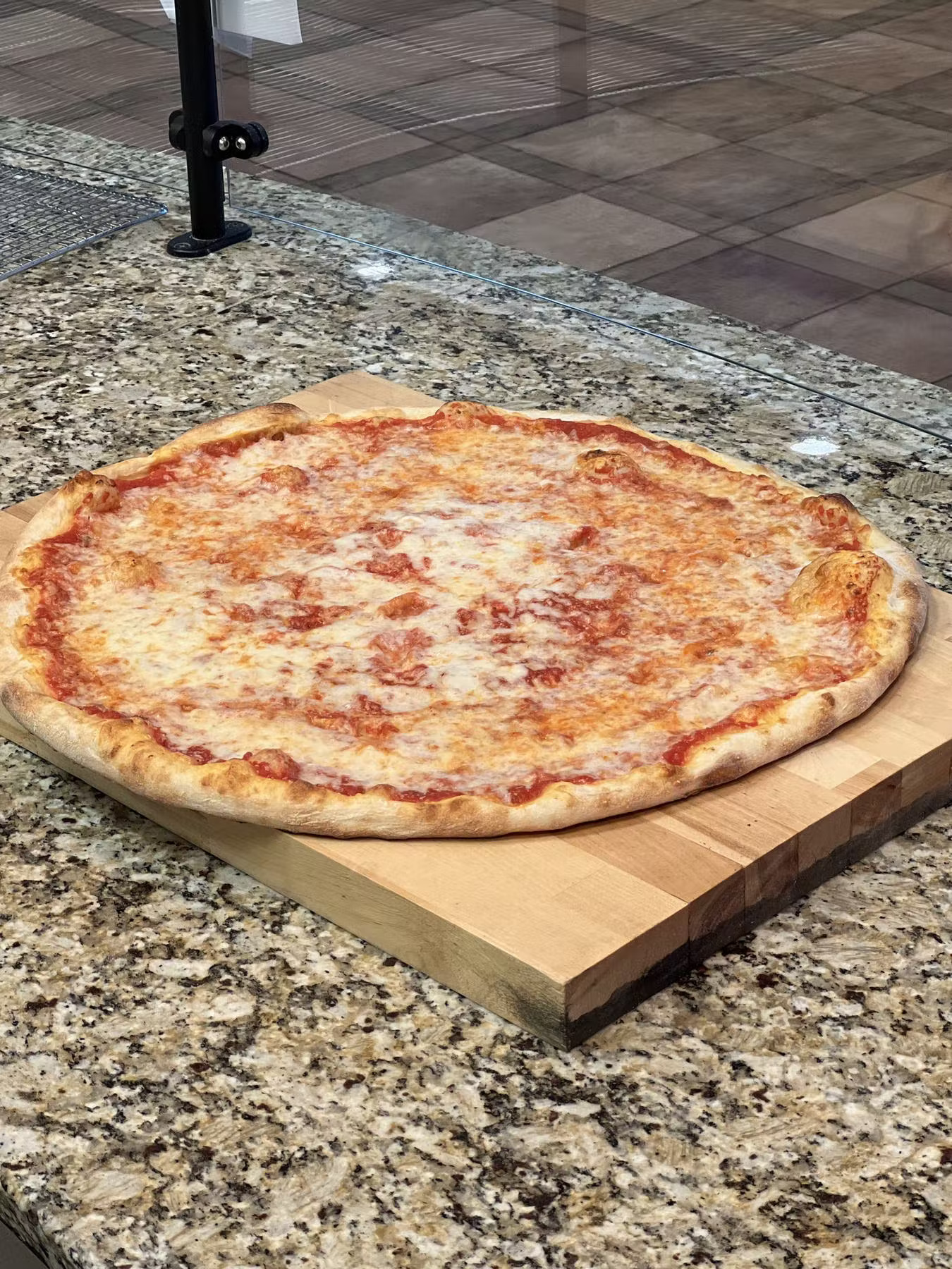 a pizza sitting on top of a table