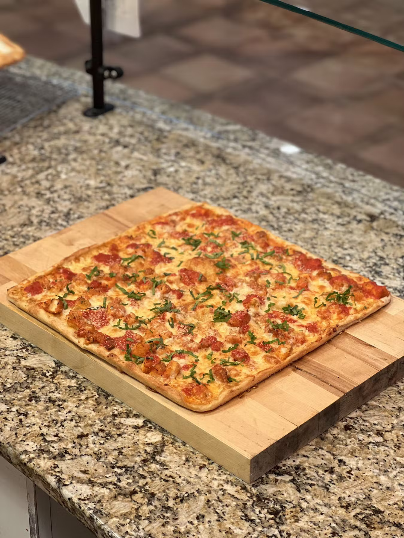 a pizza sitting on top of a box