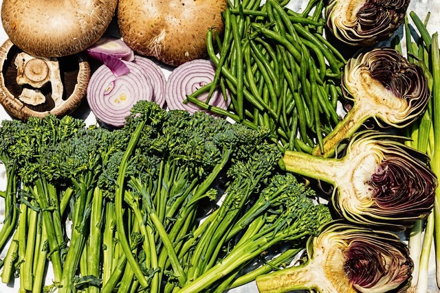 a bunch of vegetables on display