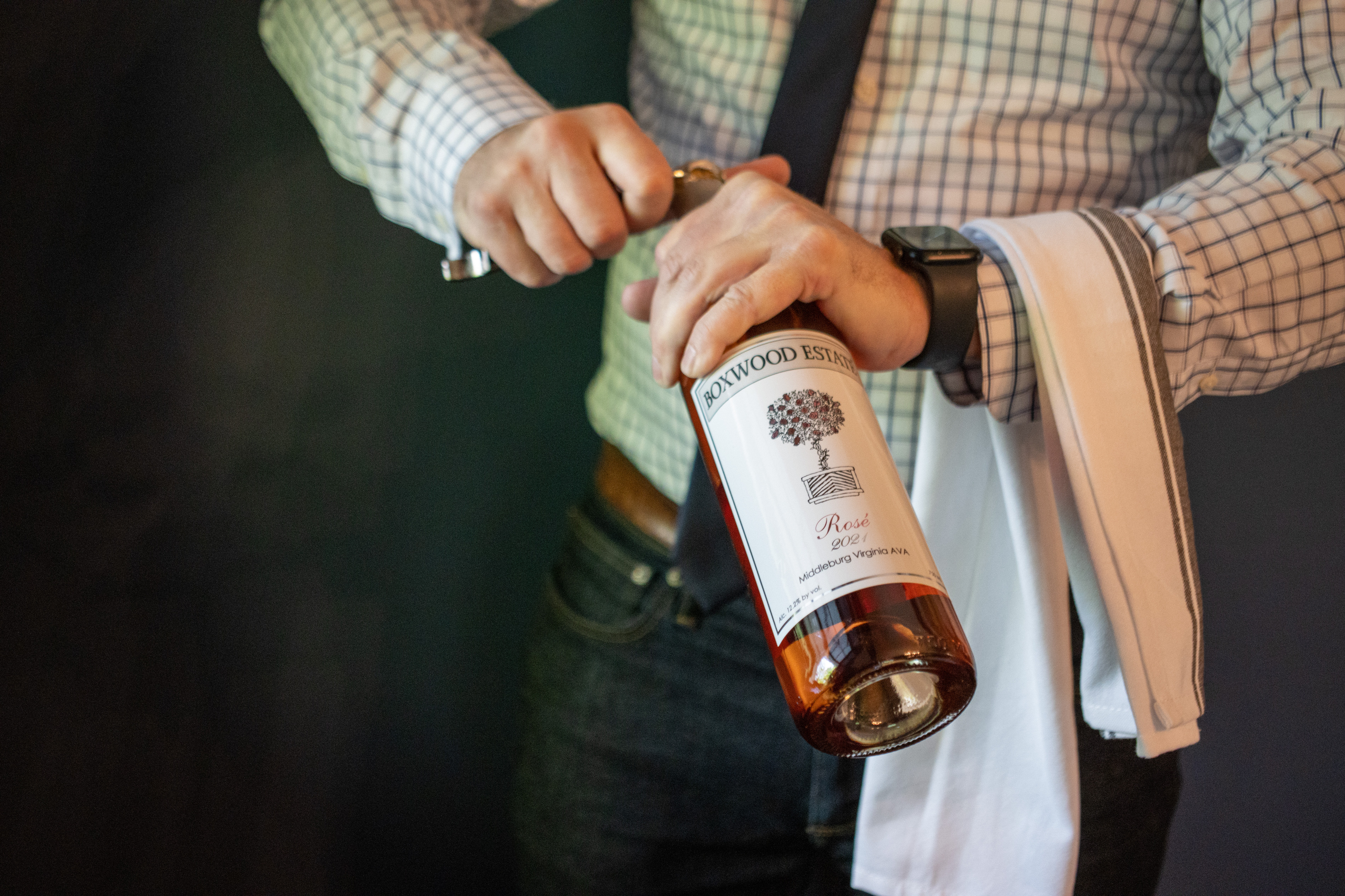 a person holding a bottle