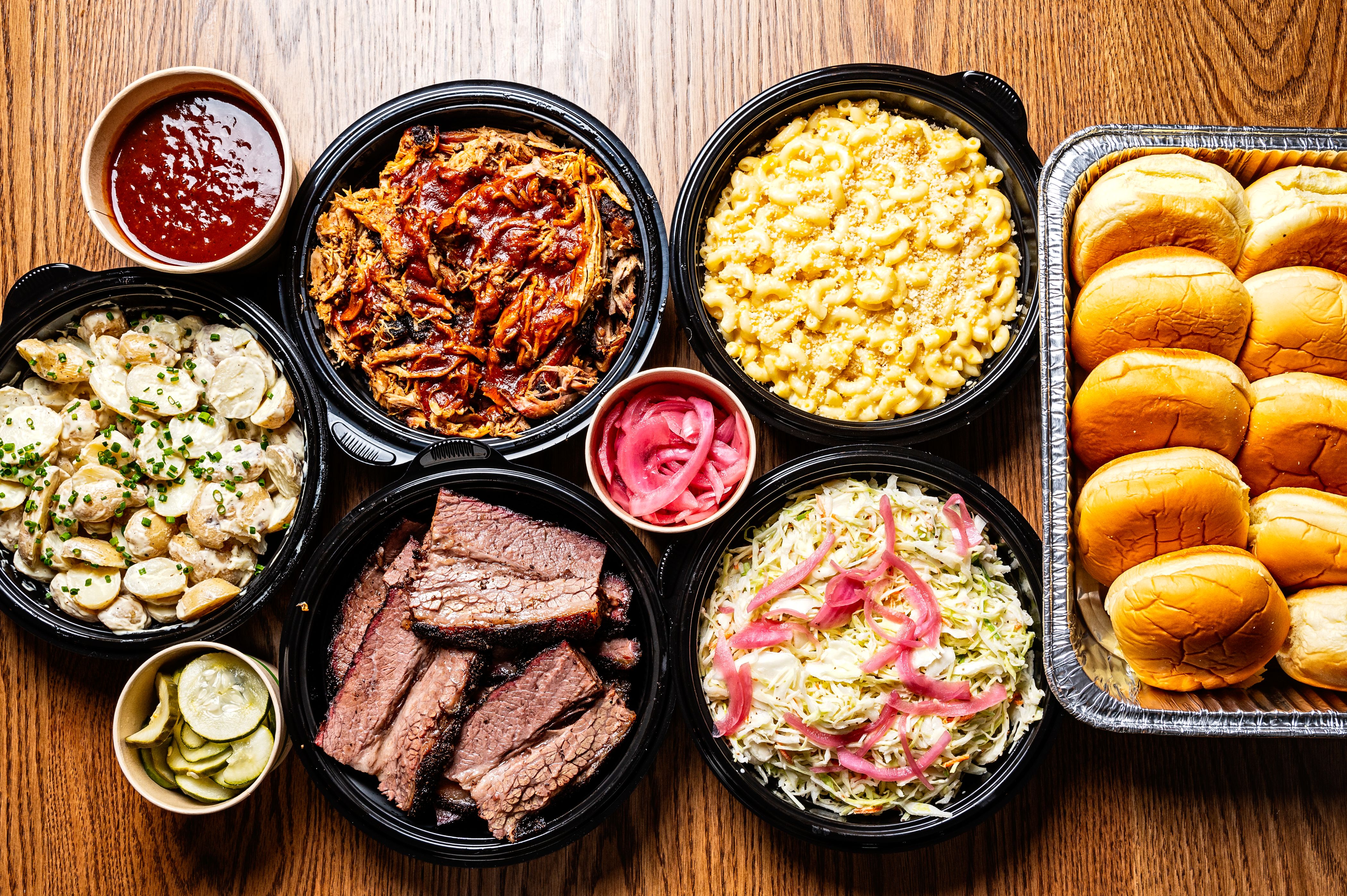 a wooden table topped with different types of food