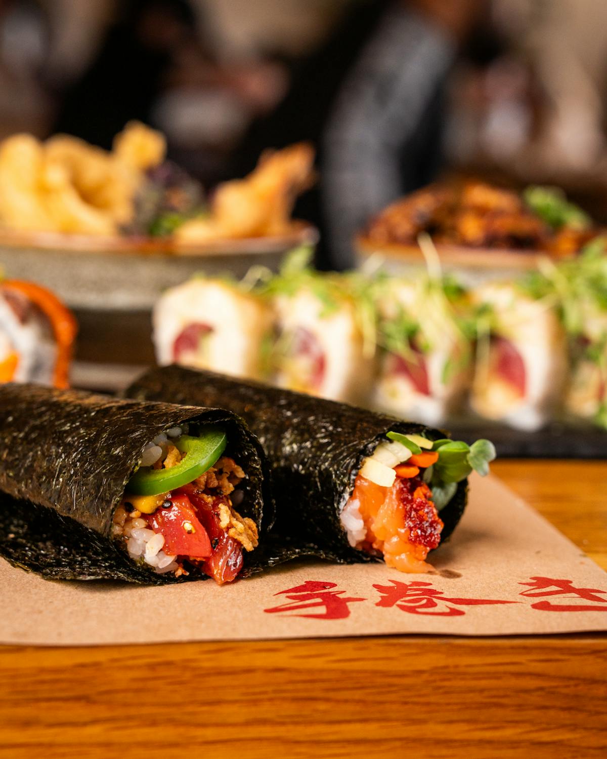 Encinitas sushi bar at Temaki Bar Sushi featuring fresh hand rolls and chefs preparing sushi in Encinitas