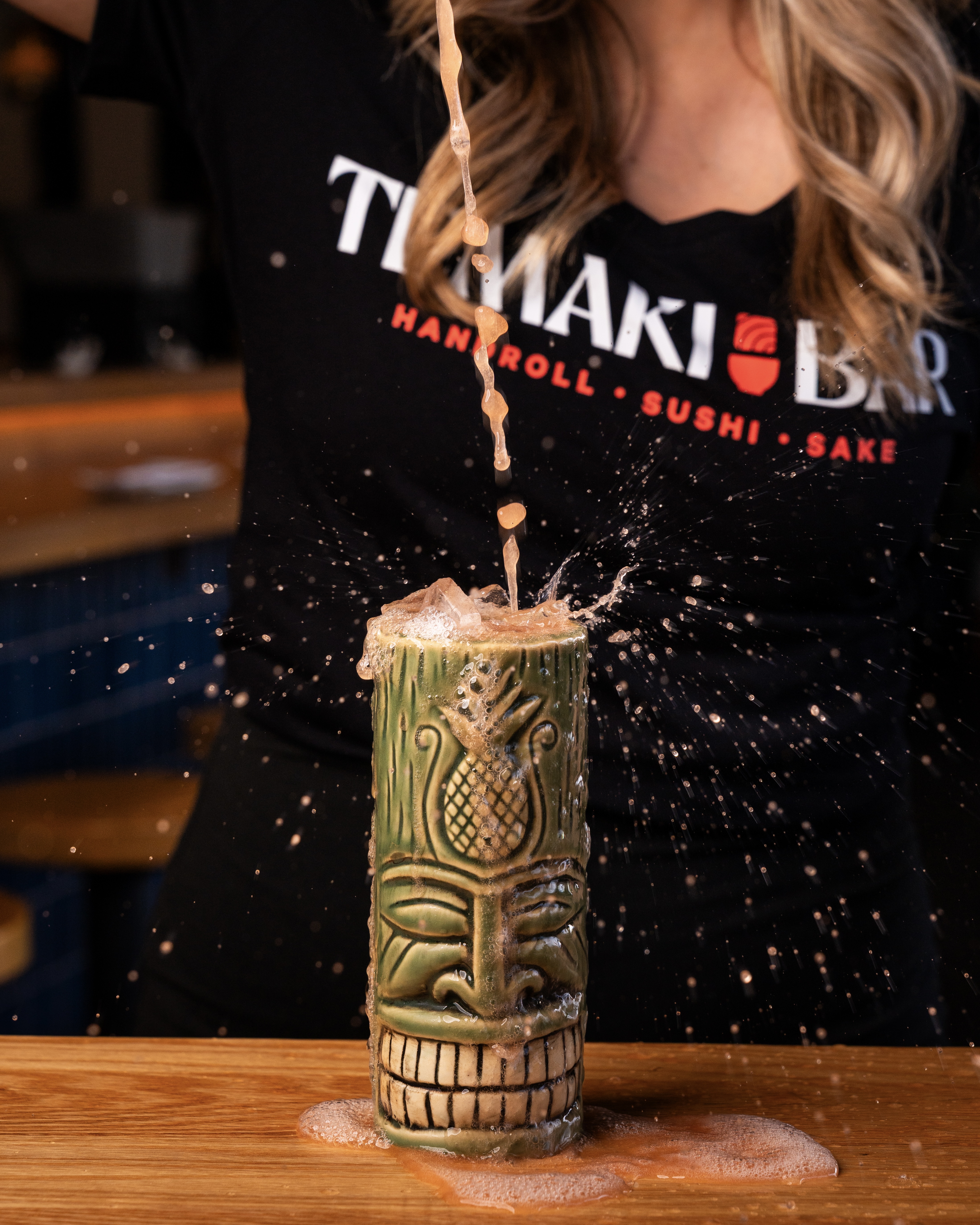 Dranksgiving at Temaki Bar in Encinitas featuring friends enjoying $50 all-you-can-drink sake, sushi hand rolls, and festive holiday vibes