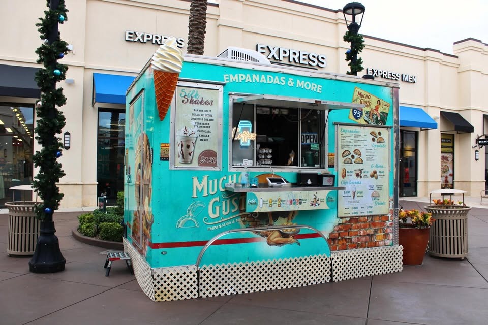 a chair sitting in front of a building