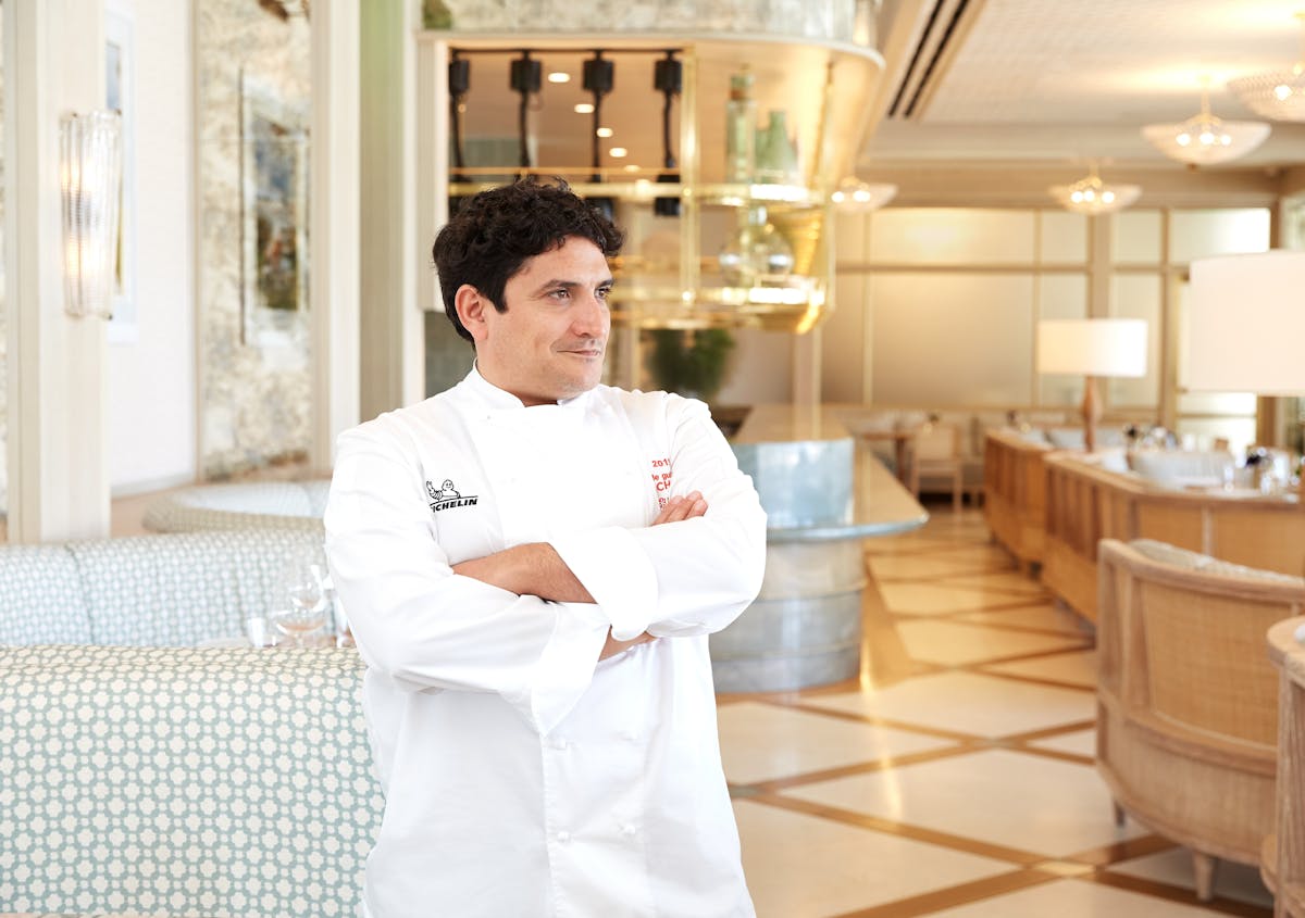Mauro Colagreco standing in a kitchen