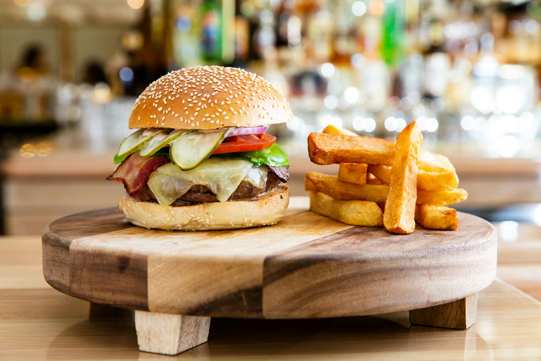 a sandwich sitting on top of a wooden table