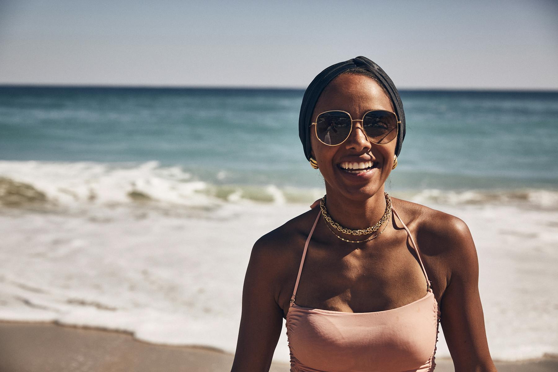a person standing in front of a beach