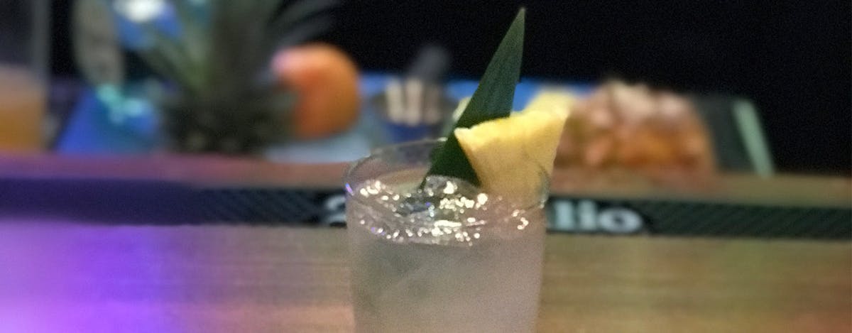 a close up of a glass cup on a table