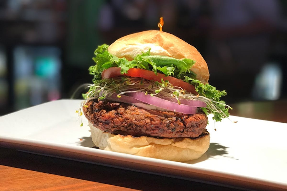 a close up of a sandwich sitting on top of a table