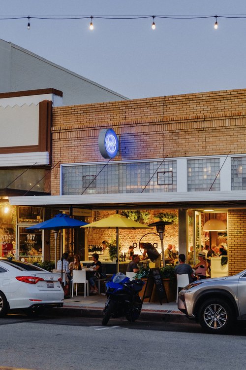a car parked on the side of a building