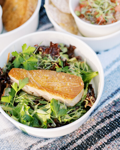 a bowl of salad on a plate