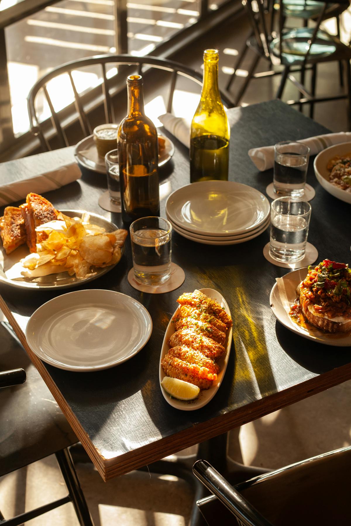 a table topped with plates of food on a plate