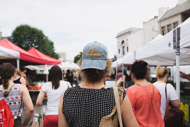 a group of people standing in front of a crowd