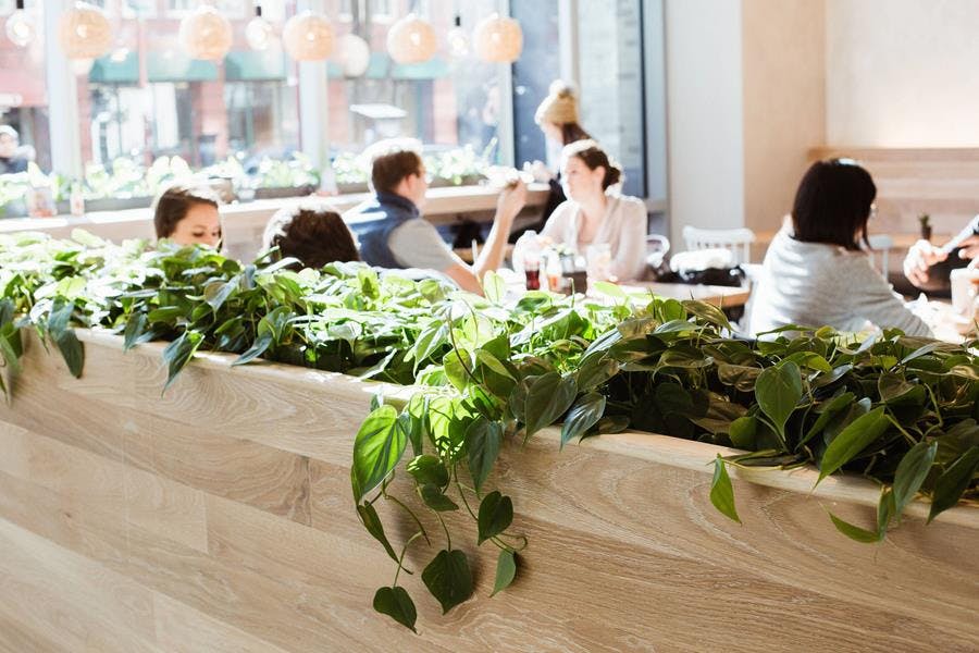 a group of people sitting at a table