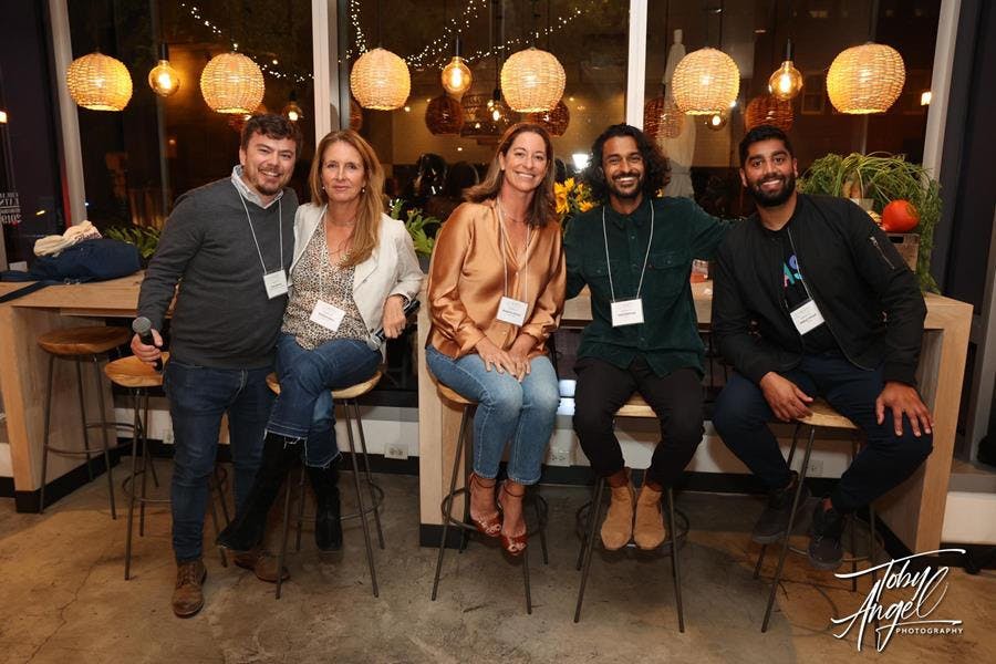 a group of people posing for the camera