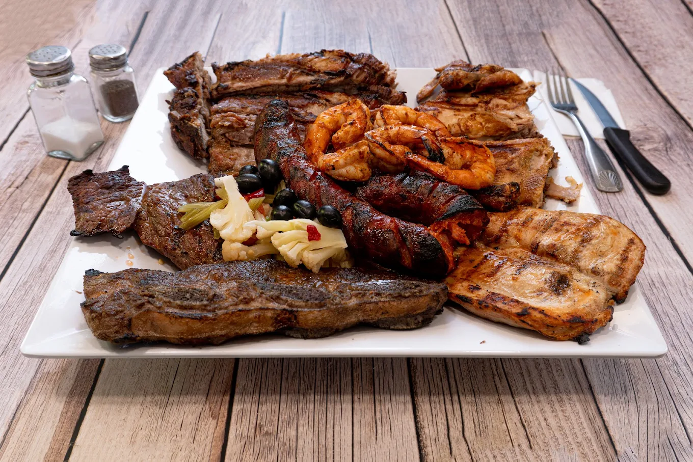 a plate of meat on a table