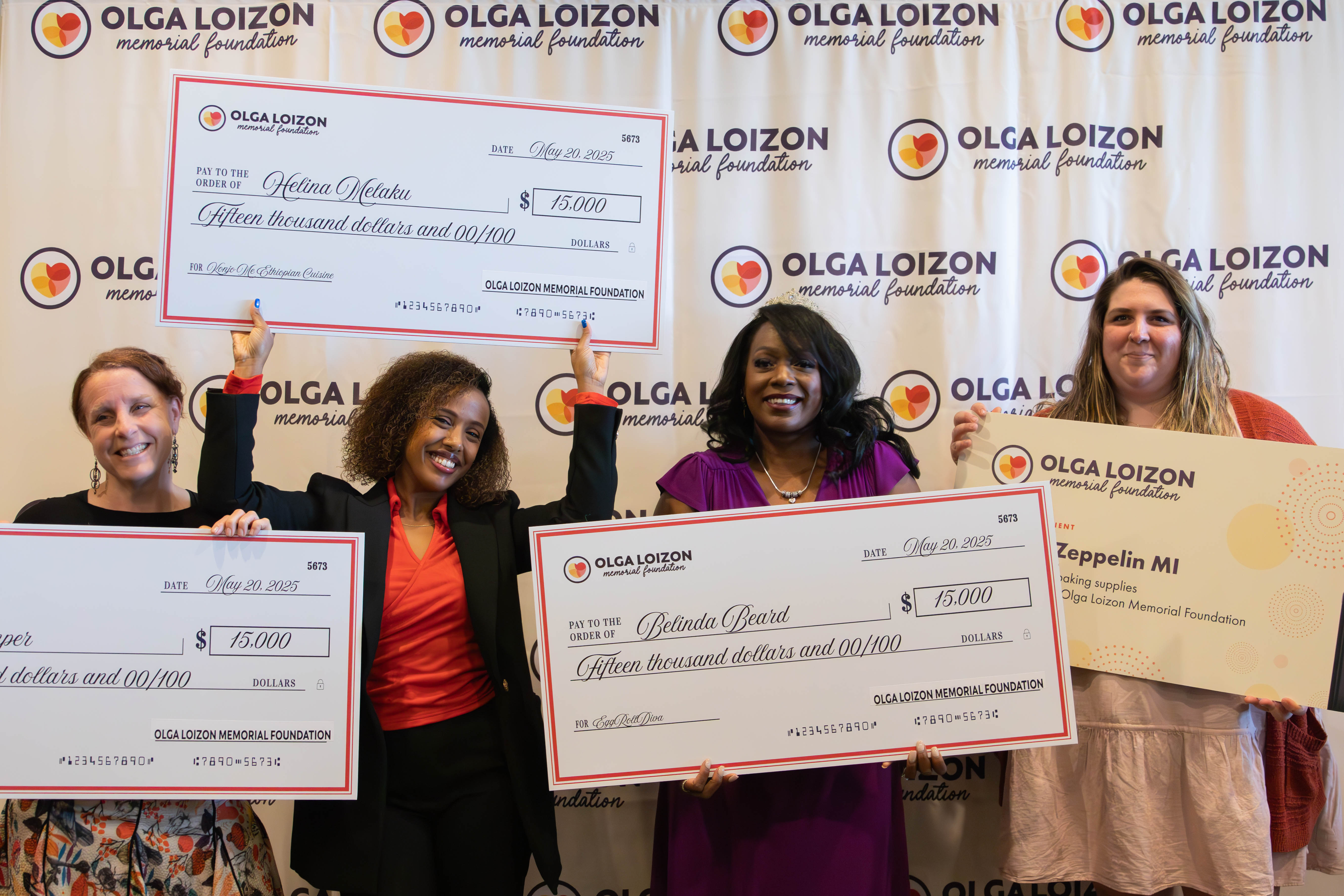 people posing for the camera 