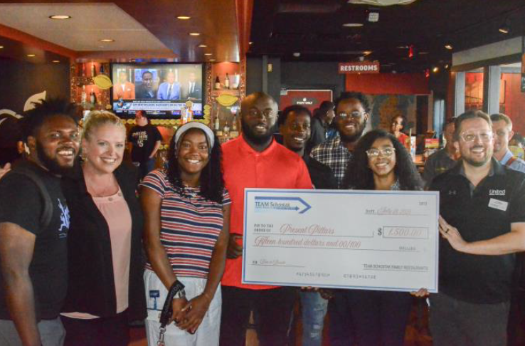 people posing for the camera