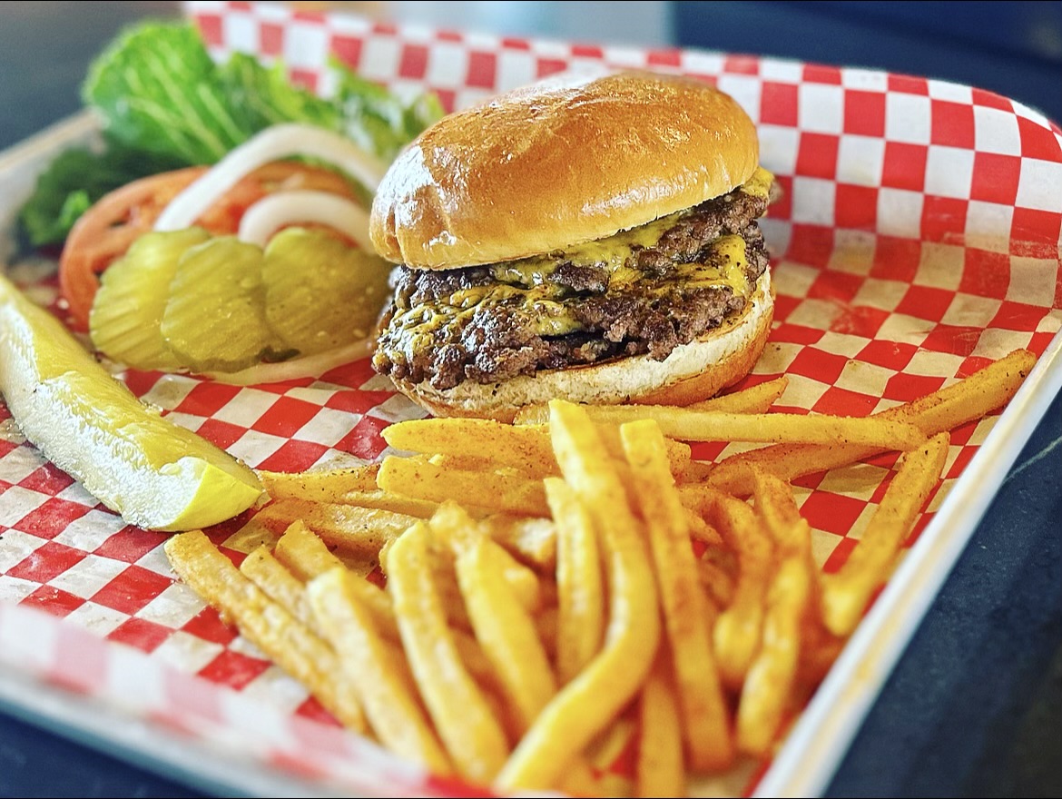 a sandwich and fries on a table