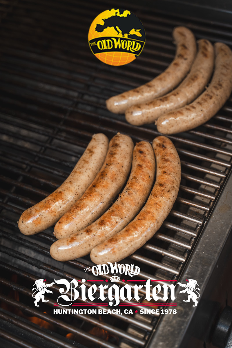Traditional German bratwurst and exotic sausage varieties grilled at Wurst Fest Old World Huntington Beach