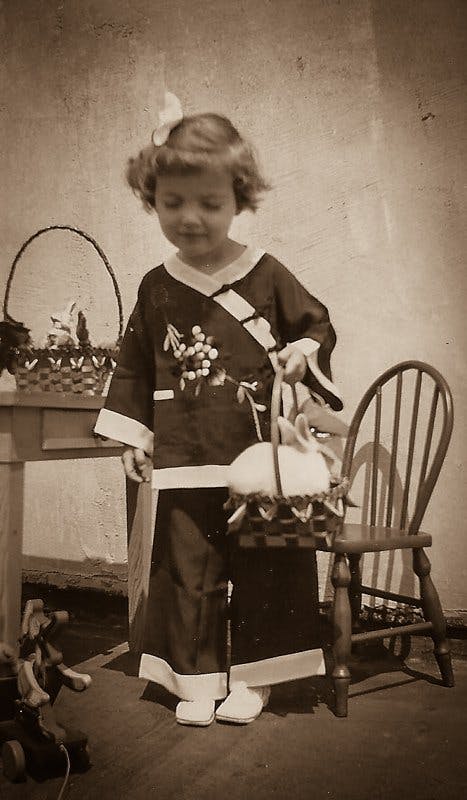 a young child sitting in a chair