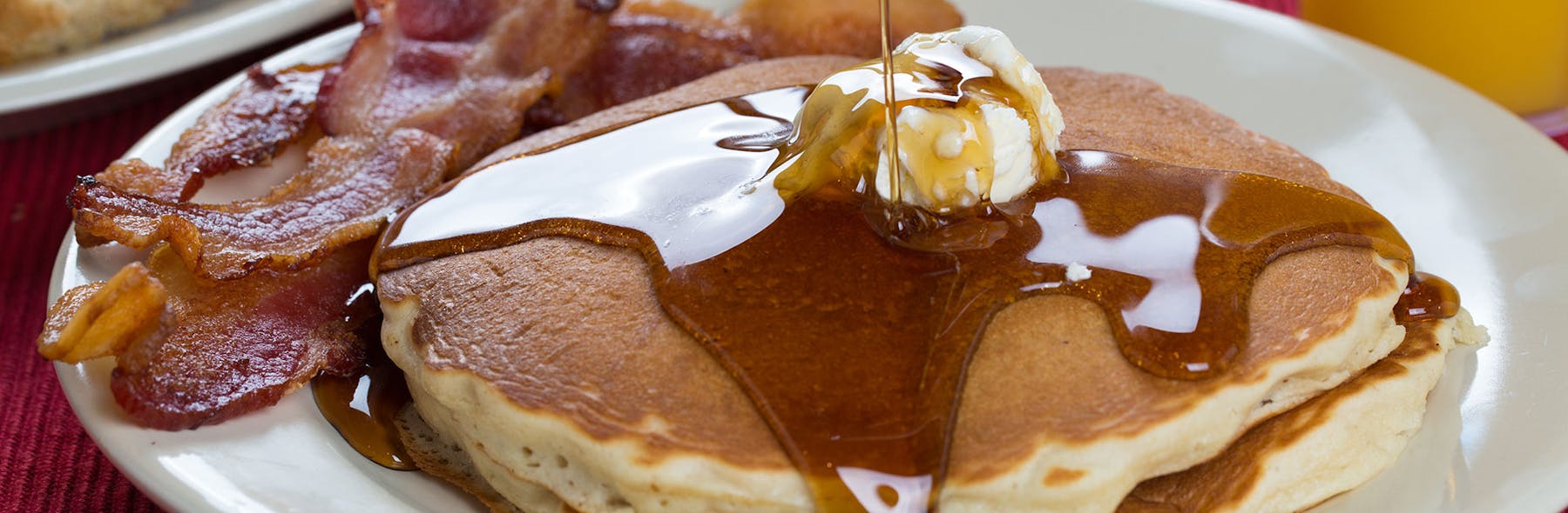 a close up of a stack of pancakes