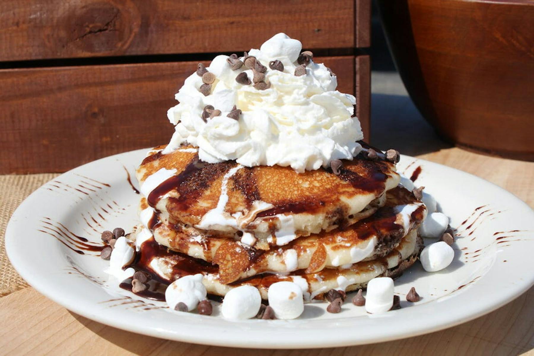 a piece of cake and ice cream on a plate