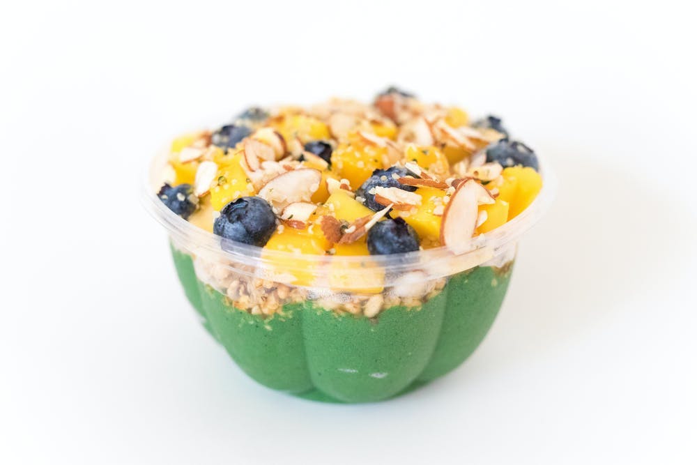 a bowl of fruit on a plate