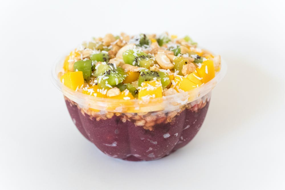 a bowl of fruit on a plate