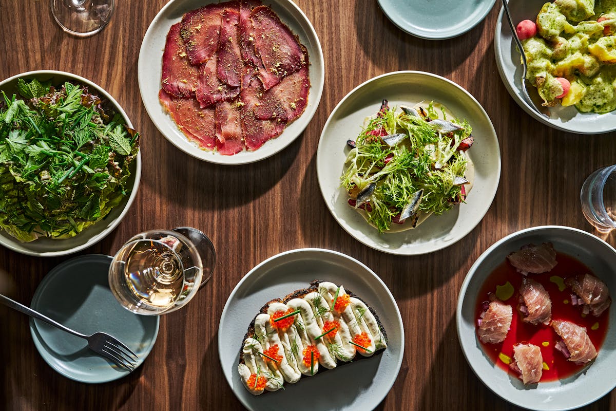 a bowl filled with different types of food on a table