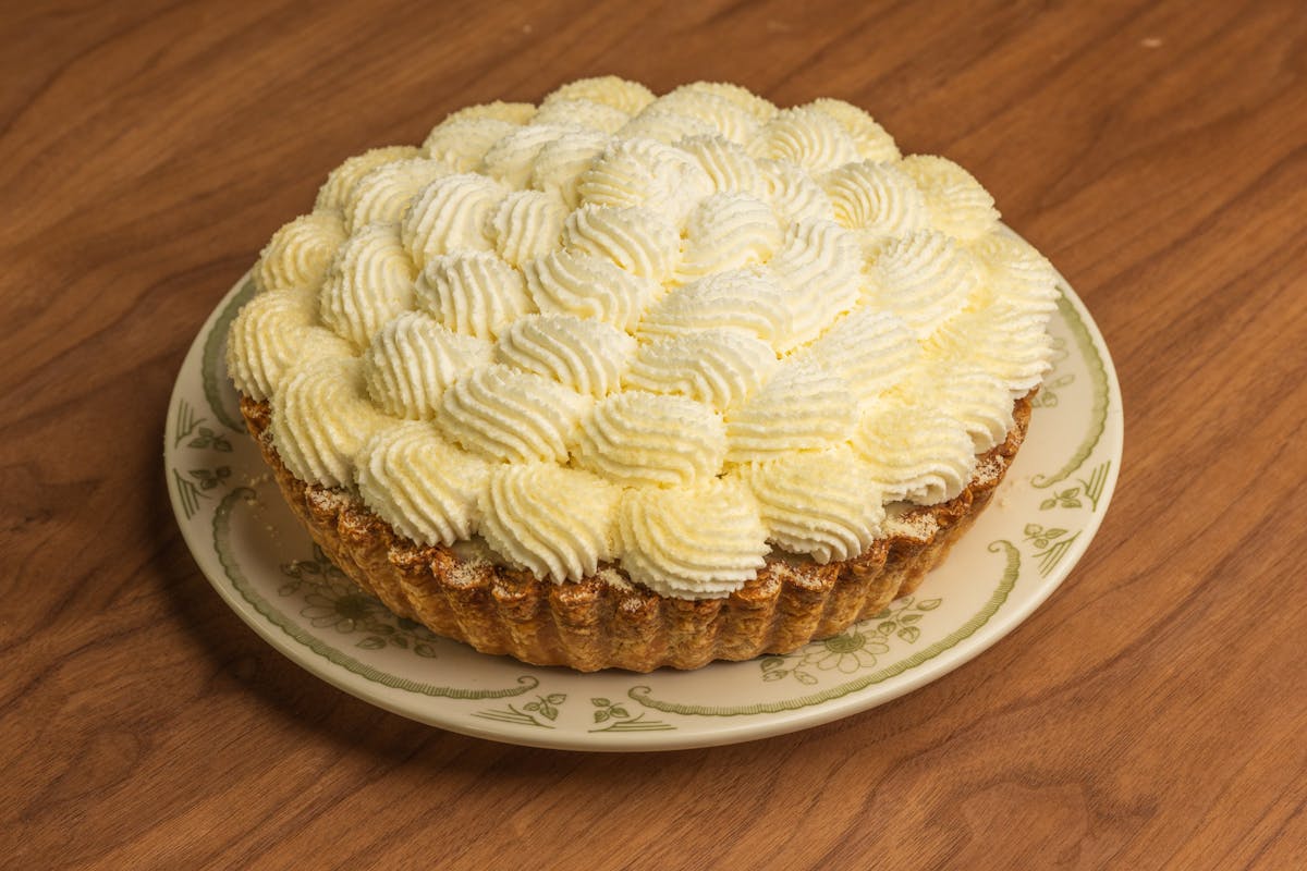 a piece of cake sitting on top of a wooden table
