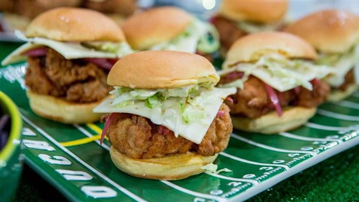 a sandwich sitting on top of a plate of food