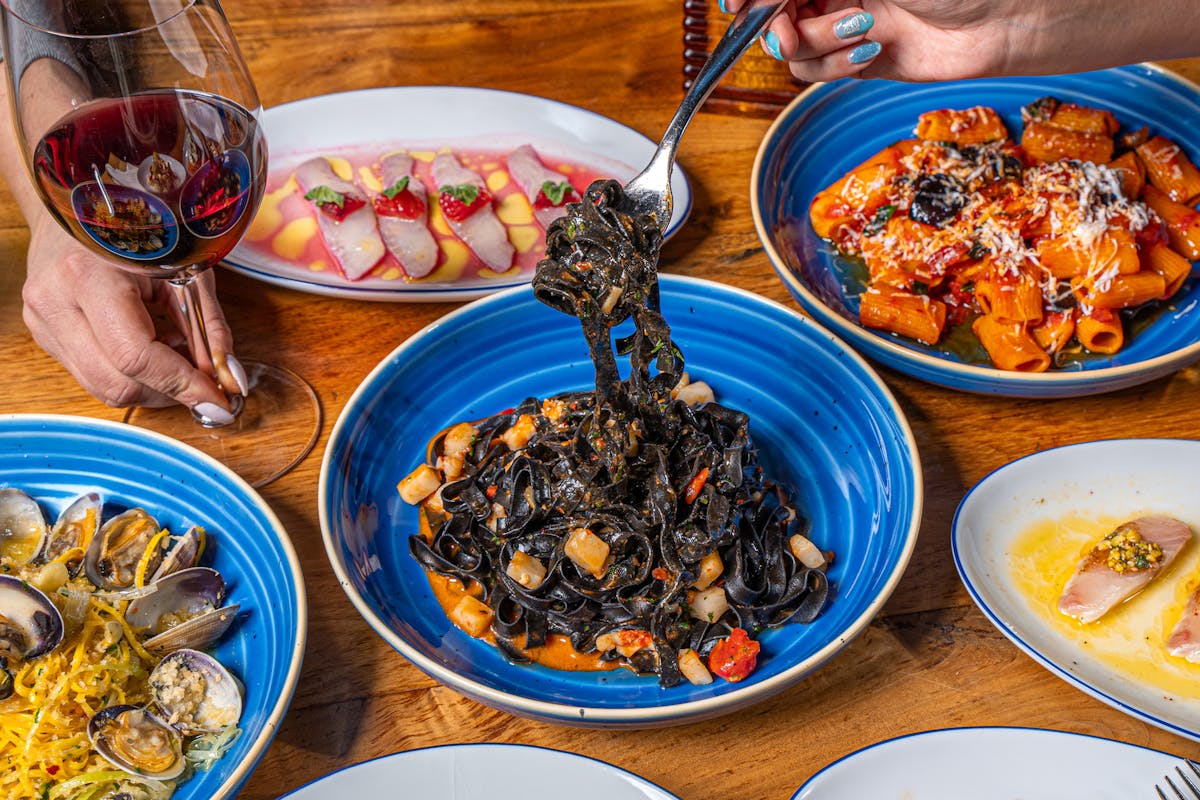 a plate full of food sitting on a table