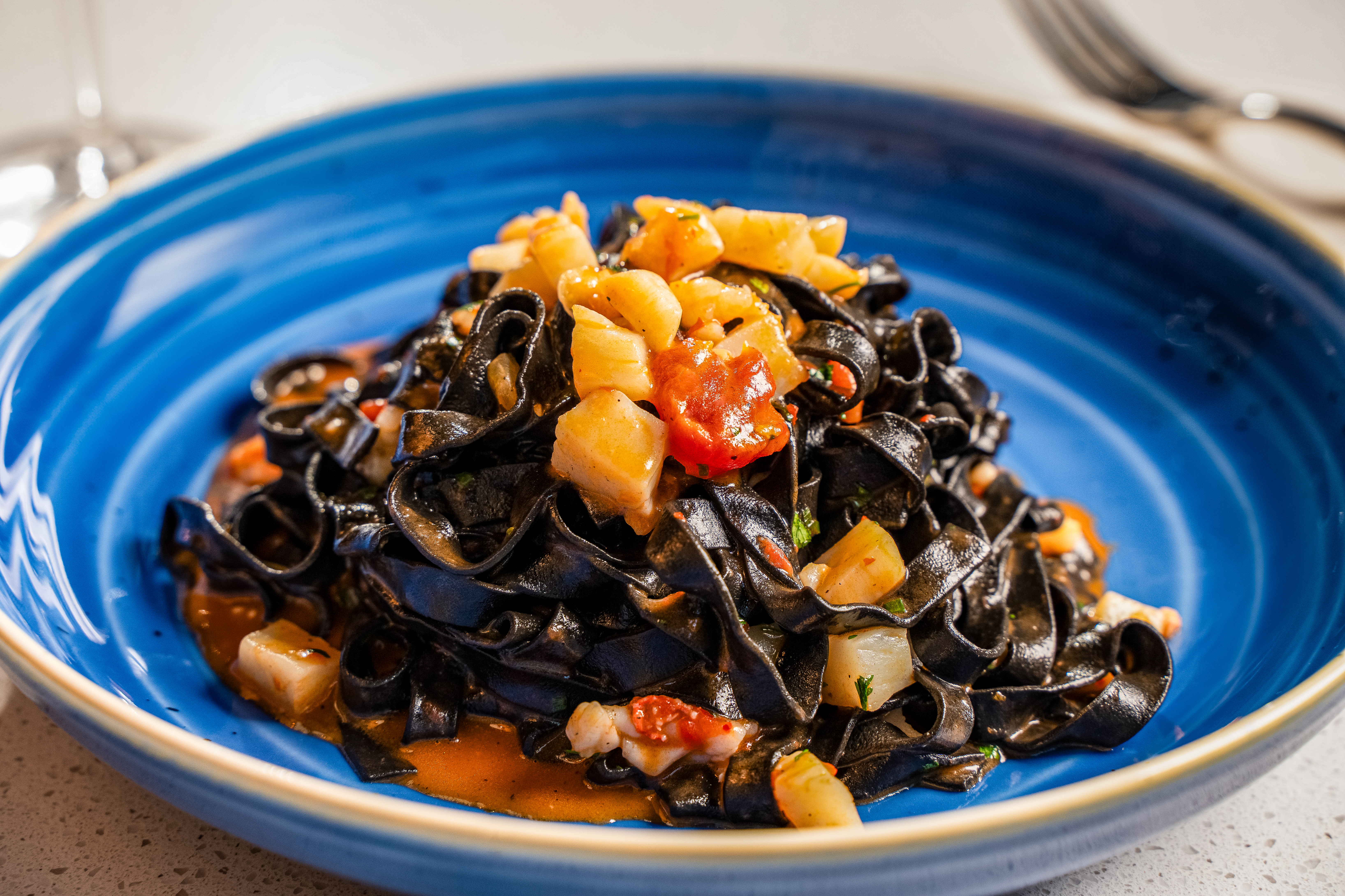 a bowl of food on a blue plate