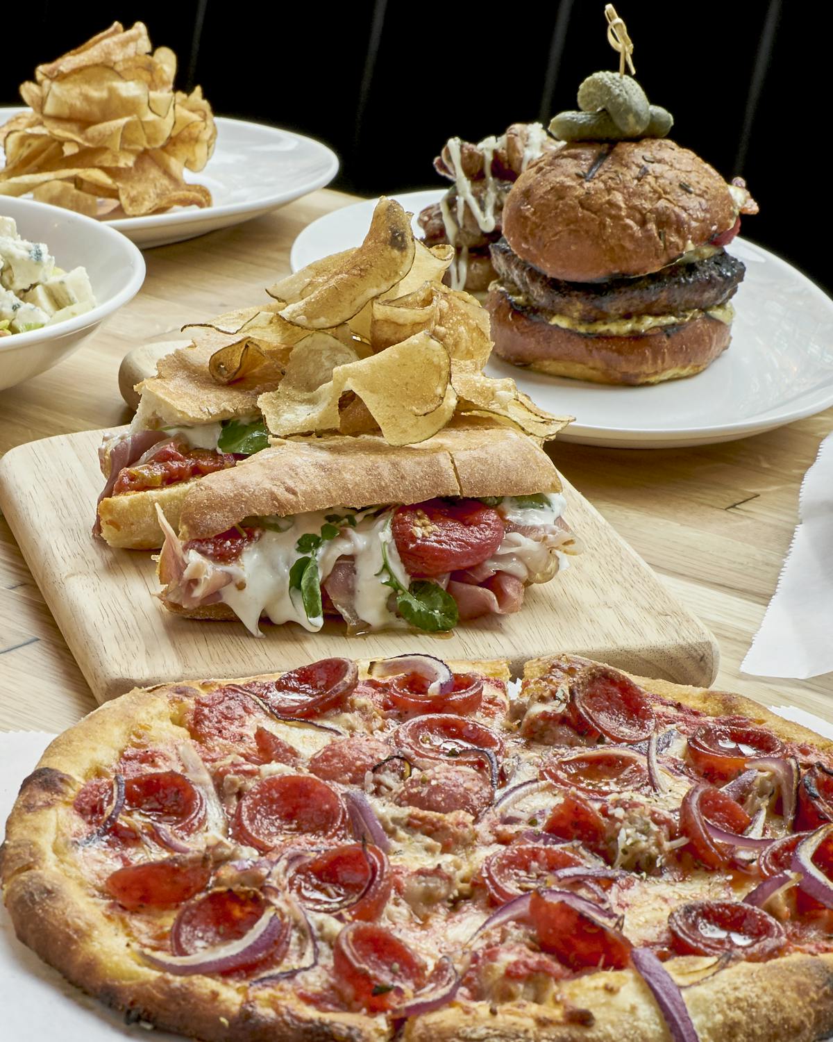 a plate of food with a slice of pizza