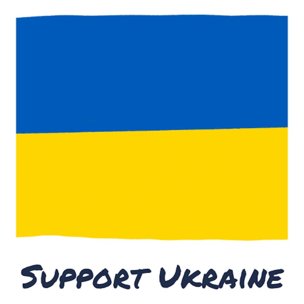 a sign in front of a palm tree