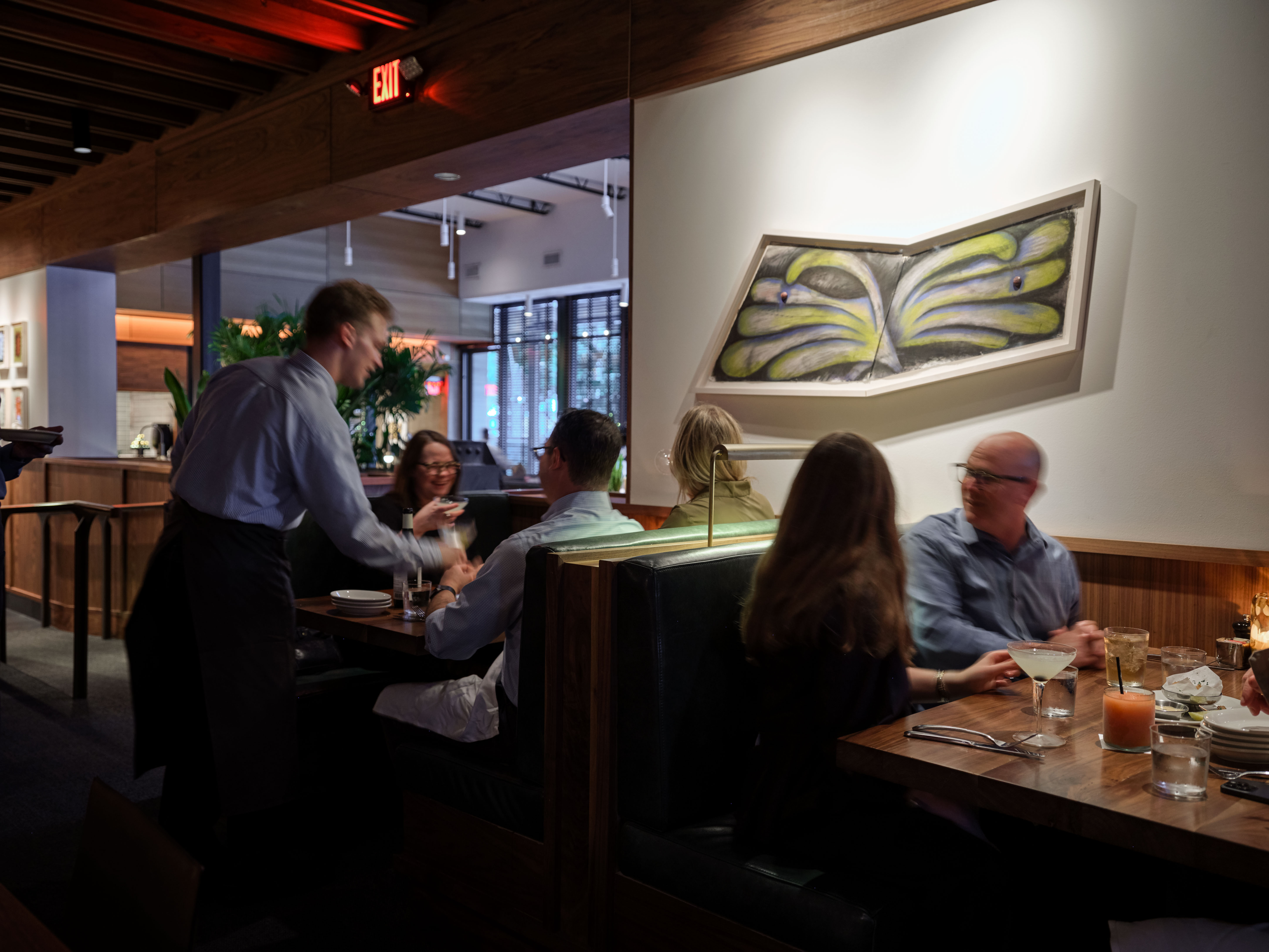 a group of people sitting at a table
