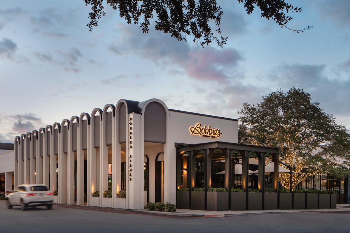 a train is parked on the side of a road