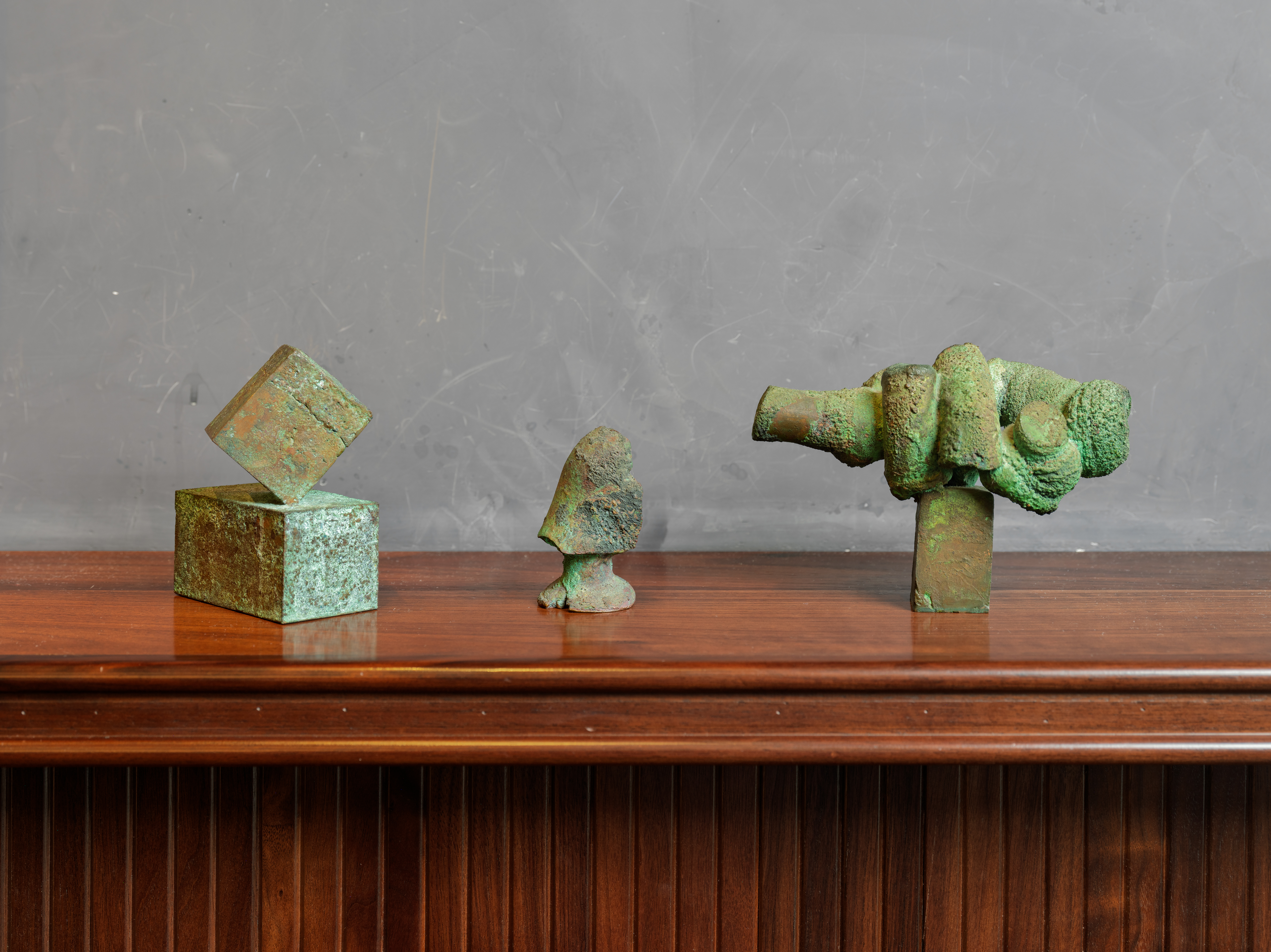 a vase sitting on top of a wooden table