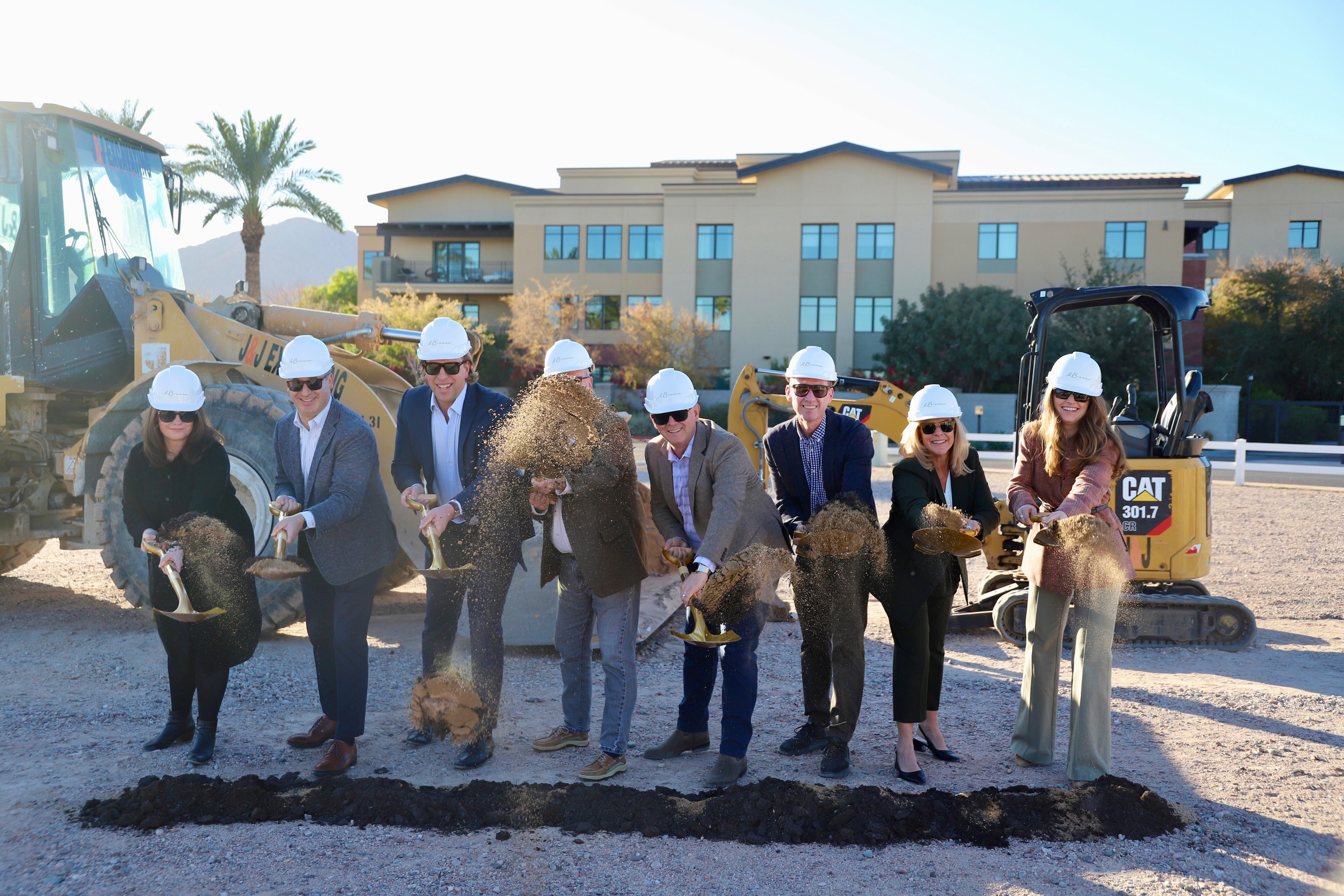 a group of people standing in front of a building