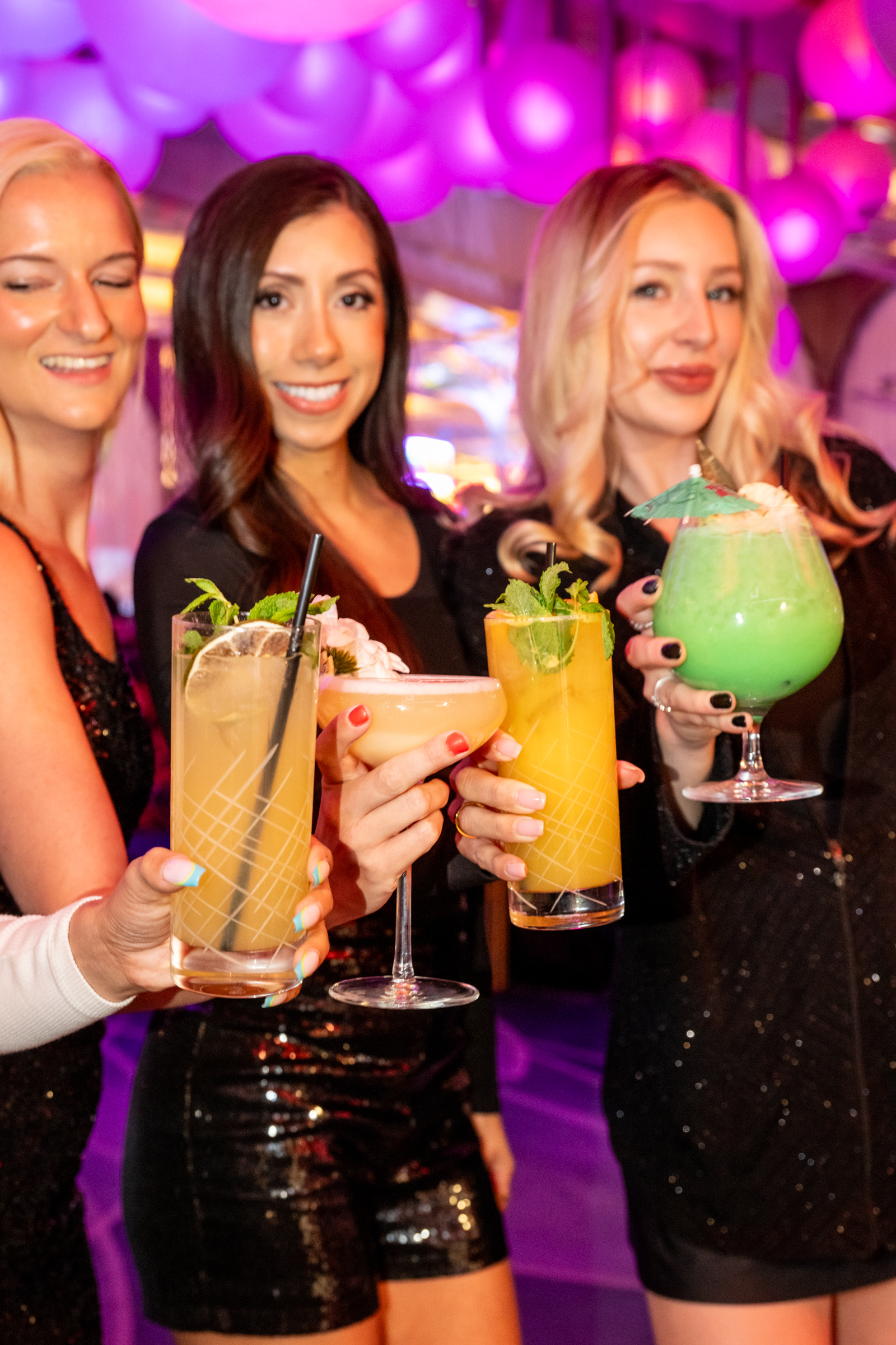 Girls with cocktails at Gatsby's lounge las vegas
