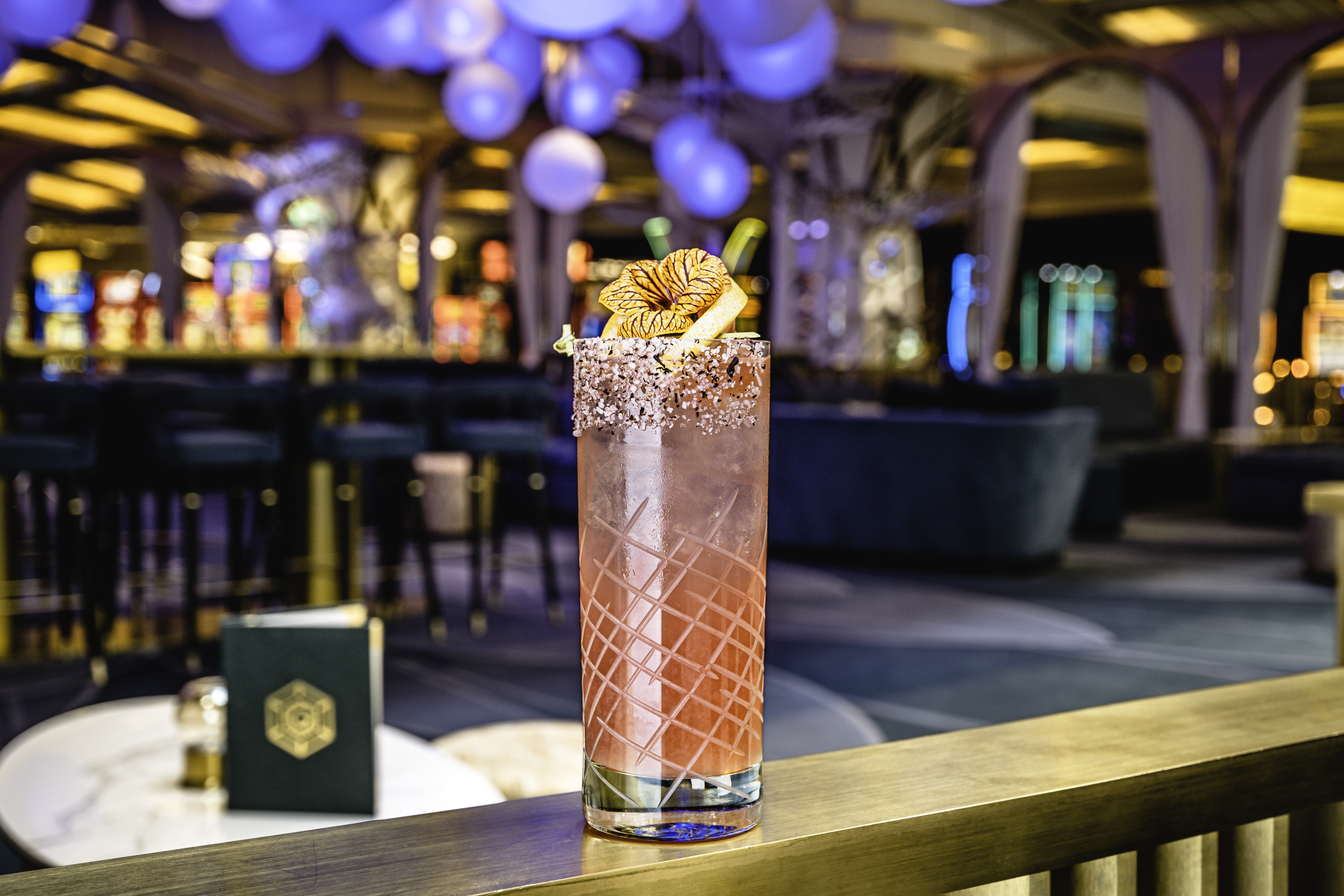 a glass of beer on a table