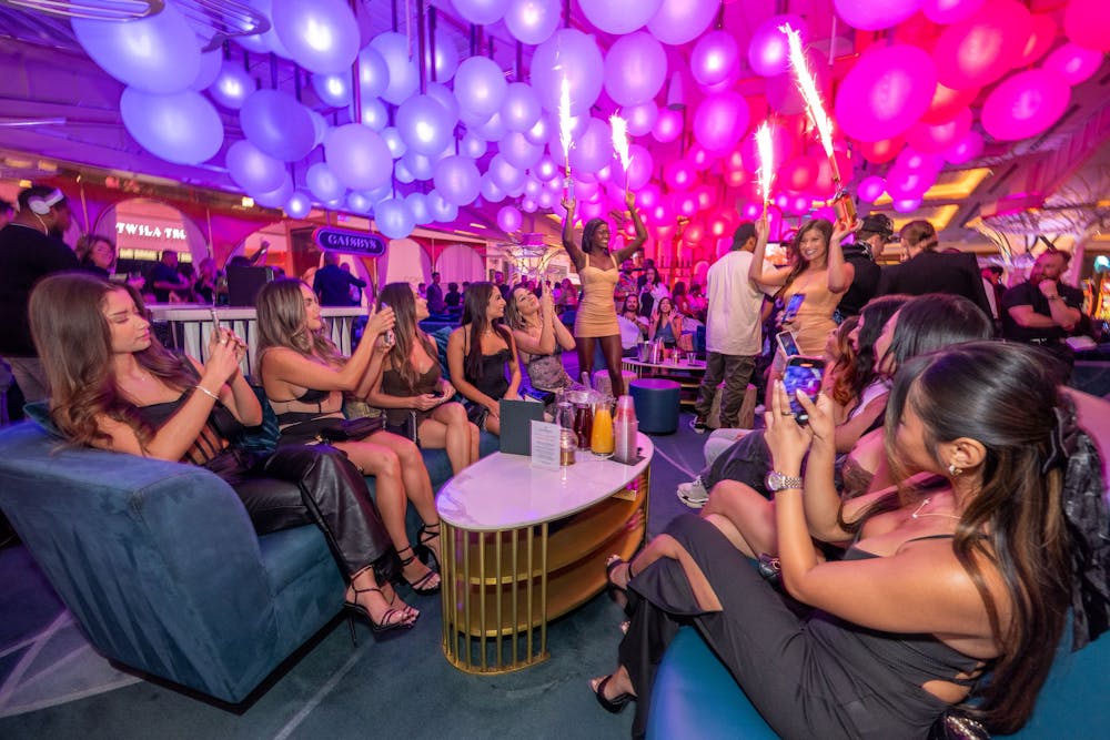 a group of people sitting on a stage