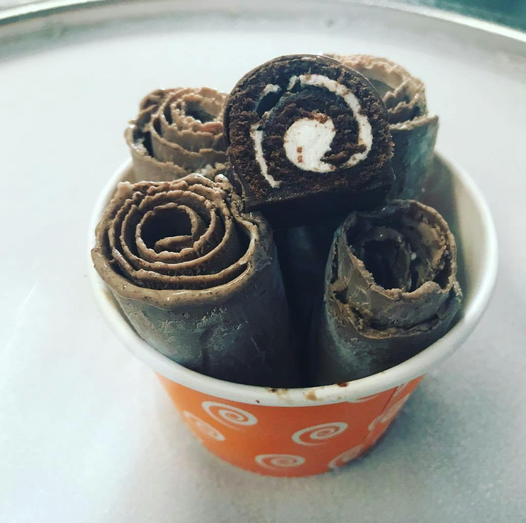 a close up of a cup on a plate
