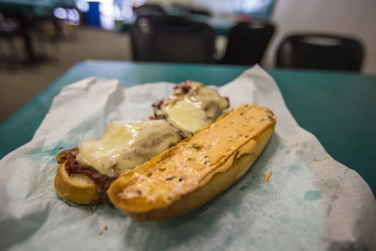 The Big Shot: roast beef, corned beef, pastrami, Swiss & Monterey Jack cheeses, Thousand Island on a hoagie roll