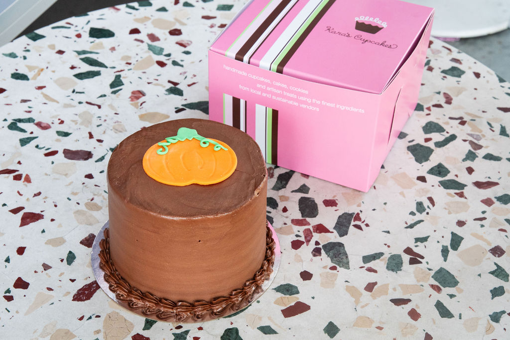 a pink birthday cake
