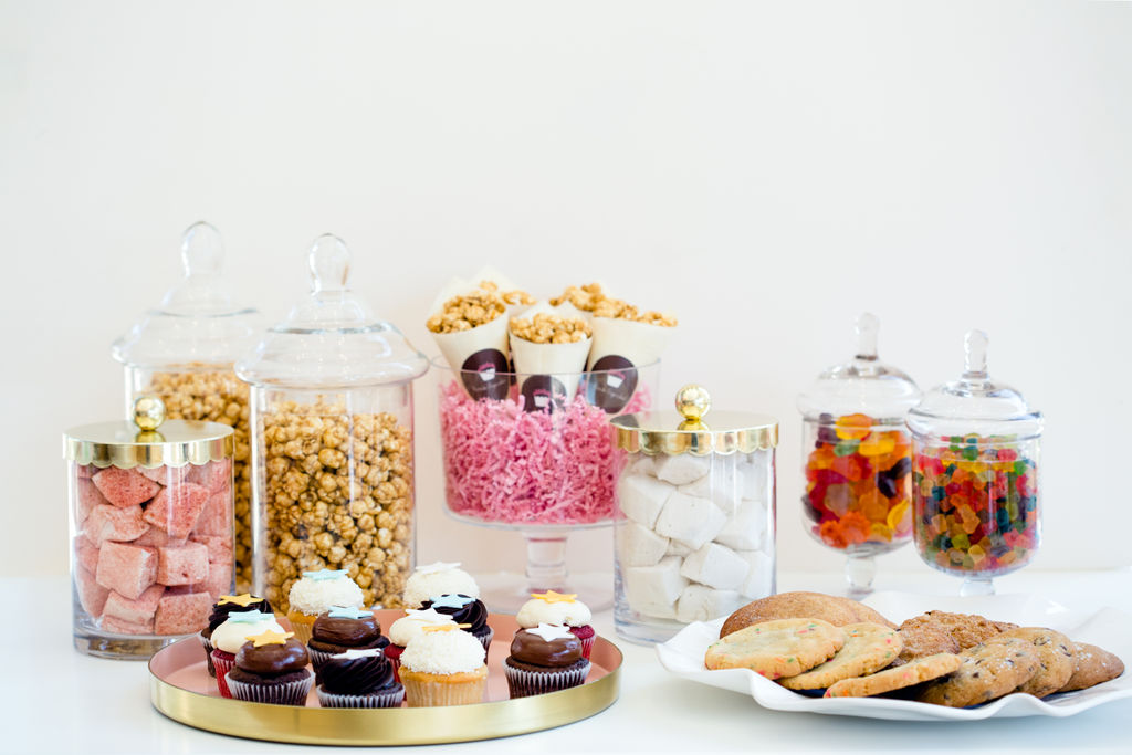 a table topped with plates of food on a plate