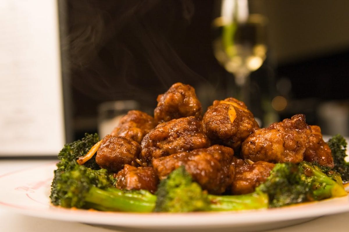 a close up of a plate of food with broccoli