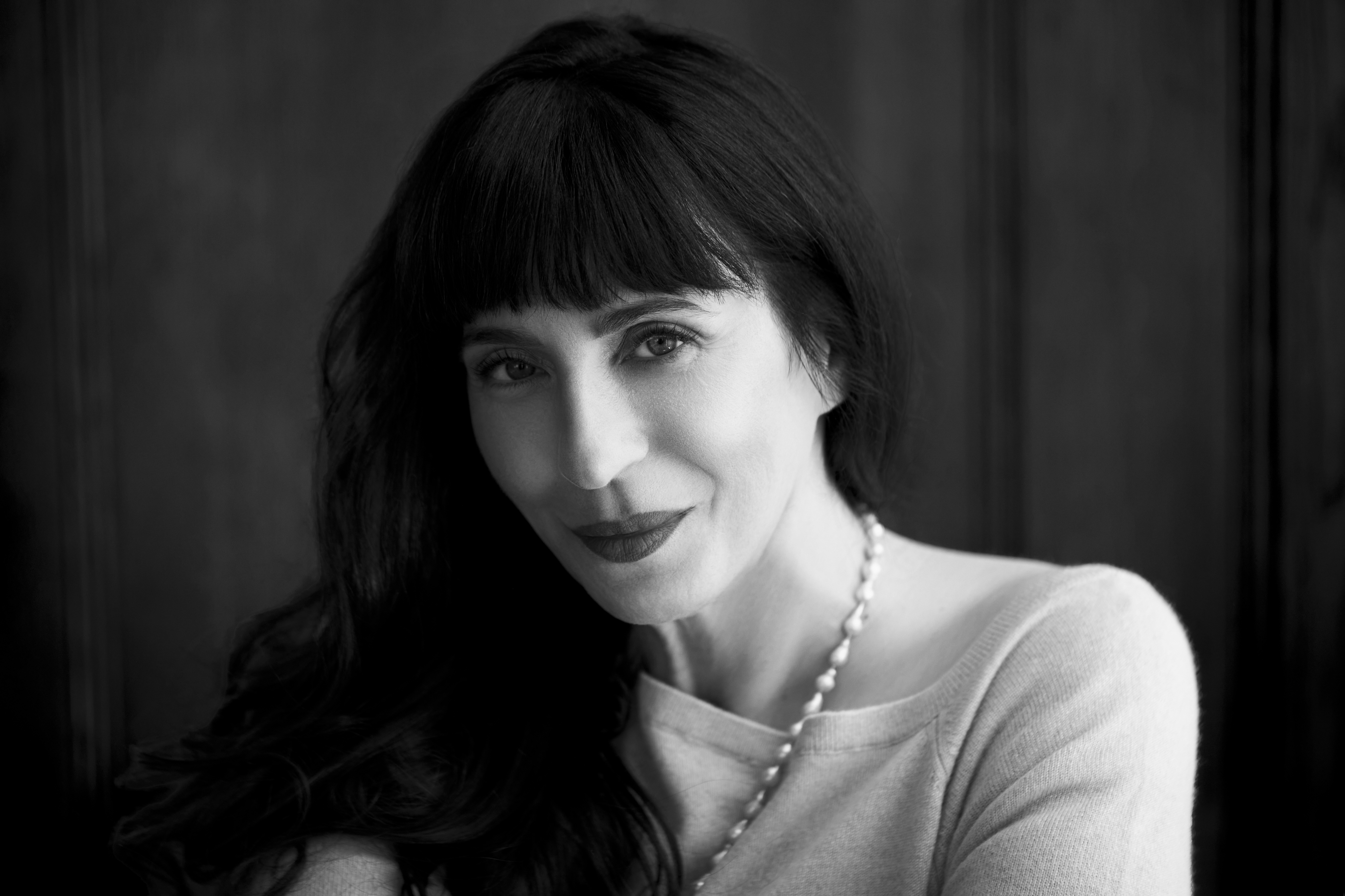 a woman looking at the camera